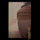 Emi bends over in a festive sweater with her bare ass to the camera and pushes out some more turds. Vertical format video. About 3.5 minutes.